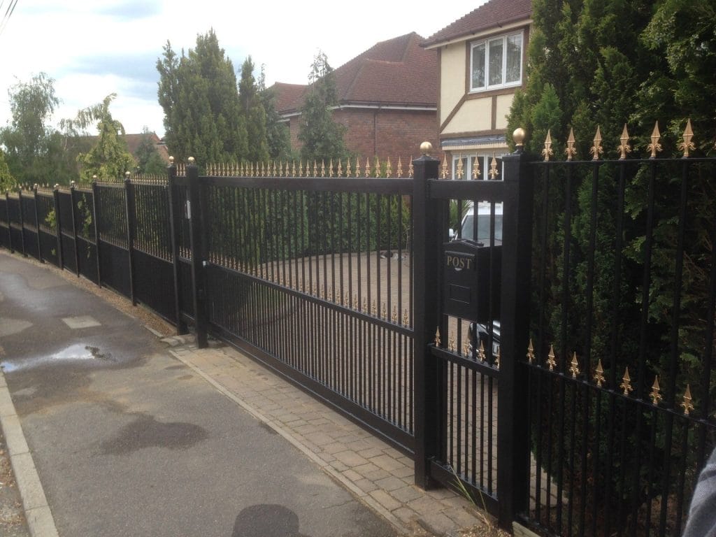 Decorative steel boundary railings with scroll design